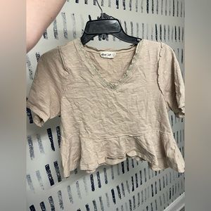 Short sleeve cream crop top